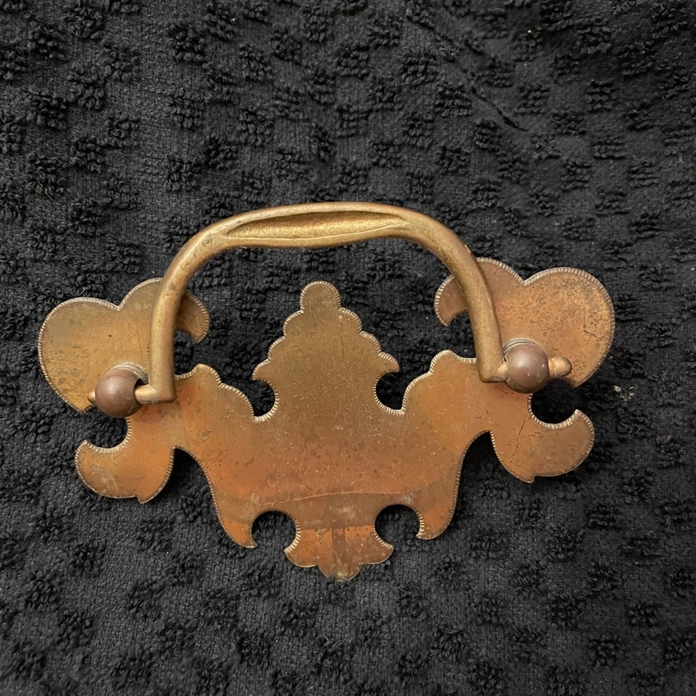 Vintage Chippendale brass dresser pulls.